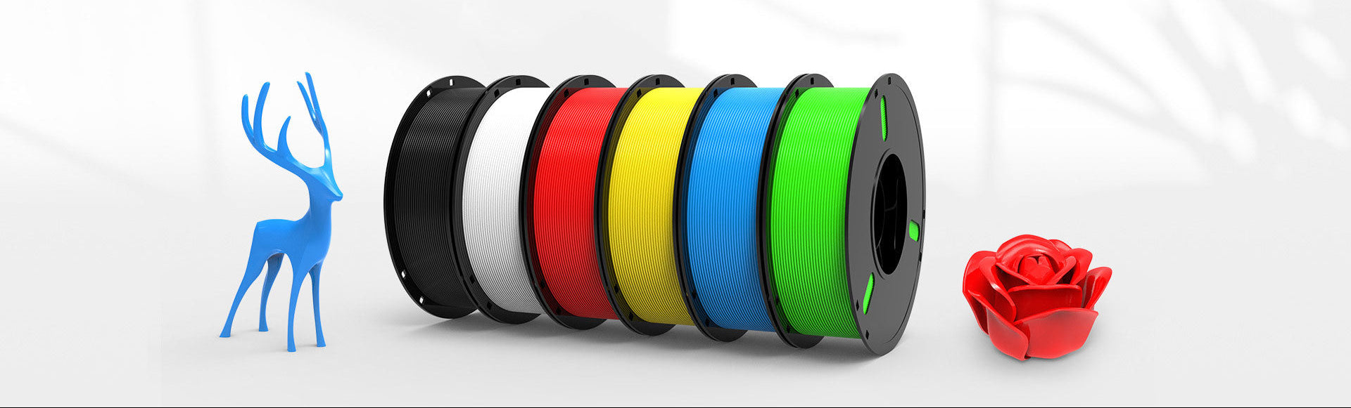 Set of colorful 3D printing filaments with a blue deer figure and red flower on a white background